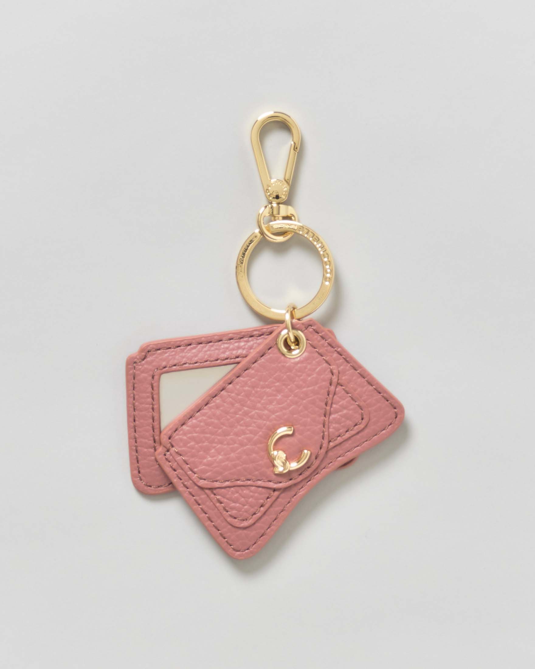 Portachiavi C-Me Coccinelle rosa in pelle a forma di borsa con specchio