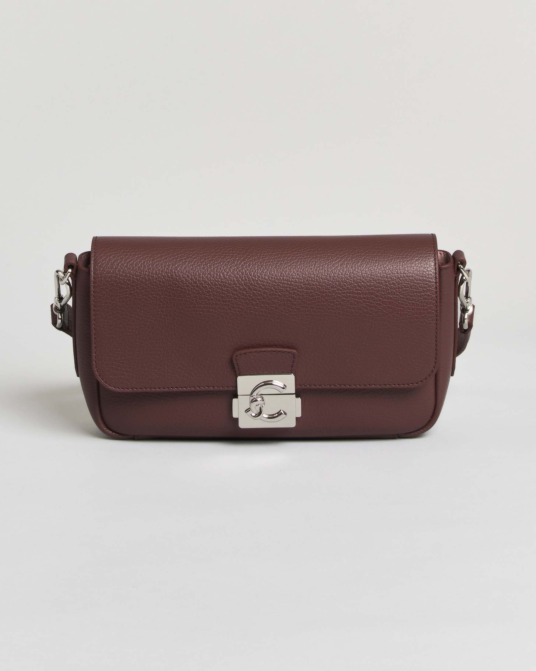 Borsa a tracolla baguette C-Me Lock Medium Coccinelle bordeaux in pelle bottalata con logo argento