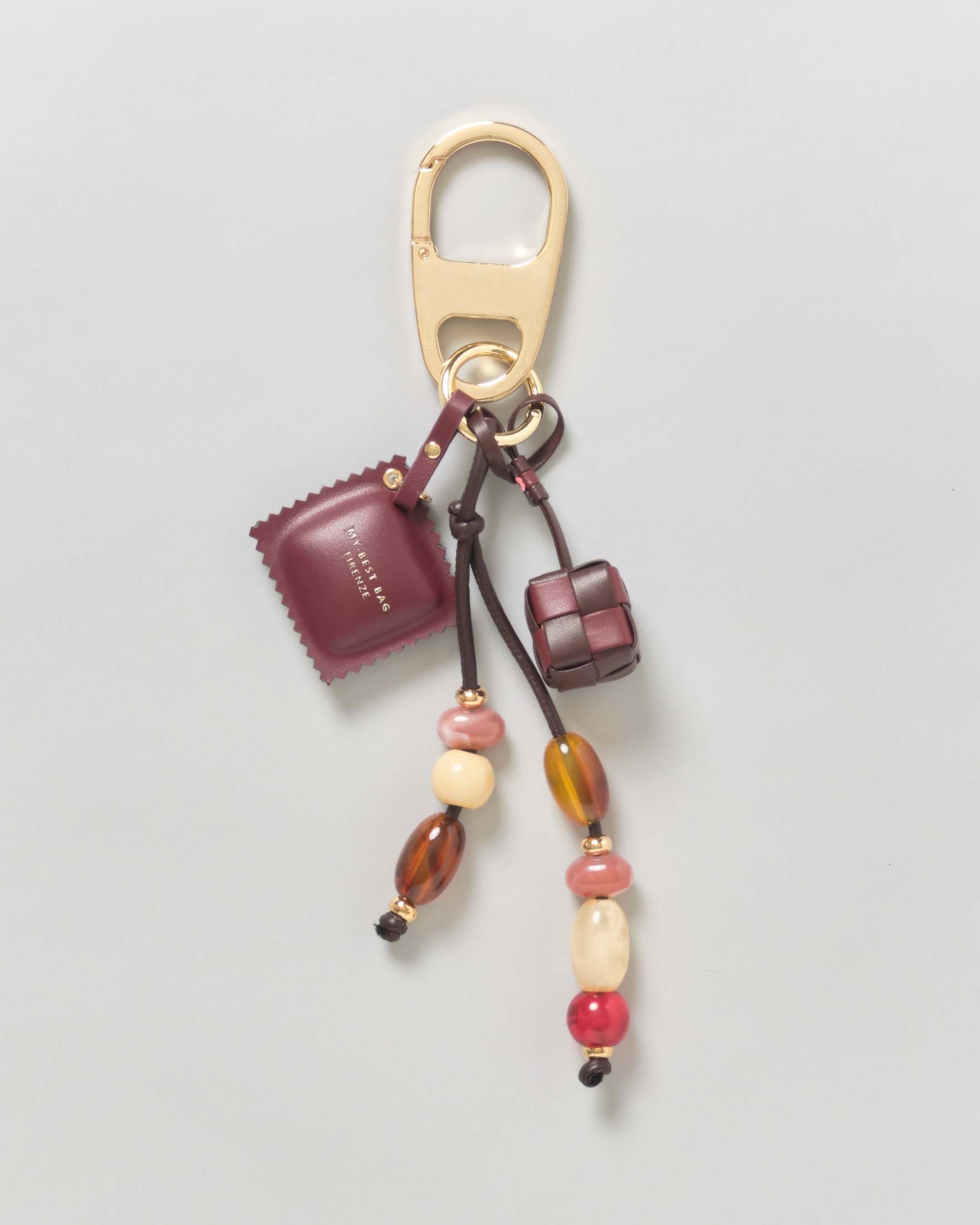 Portachiavi My Best Bag oro con perline colorate e charms a tortello marrone e dado in pelle intrecciata
