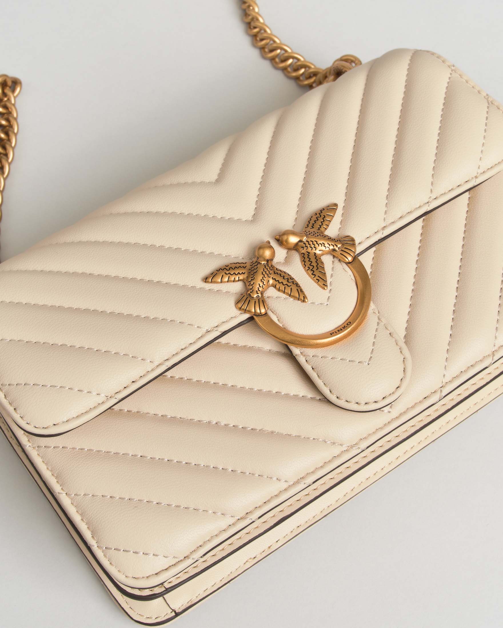 Borsa a tracolla Mini Love Bag One Pinko bianca in nappa chevron con fibbia logo e catena dorati image